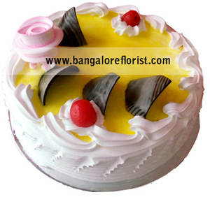 Eggless Pineapple Cake Flowers Delivery in Cubban Road Bangalore